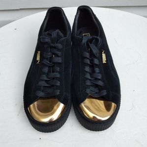 Puma Blk/gold suede platform sneaker